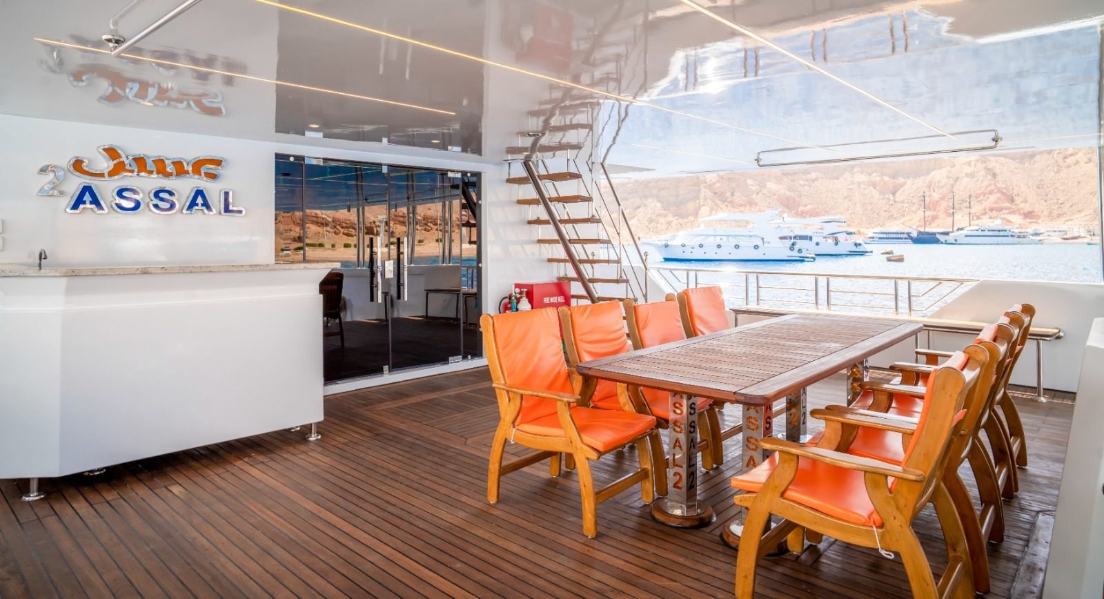 Aft-deck dining table with Sinai mountain views